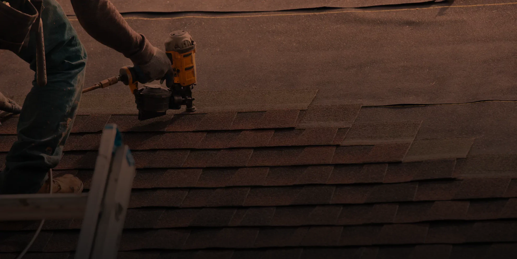 a man installing roofing